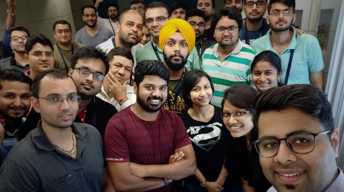 Lakshmi at the Delhi Tableau User Group in 2018. Lakshmi is pictured in the middle wearing a red t-shirt. 